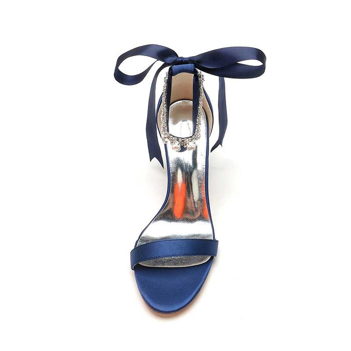 Navy blue rhinestone prom shoes for women with a stylish ribbon detail and shiny finish