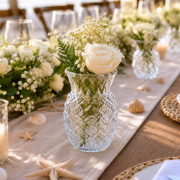 Clear Pineapple Glass Bud Vase with white roses on a coastal-themed tablescape