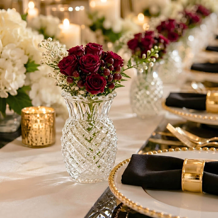 Clear Pineapple Glass Bud Vase with dark red roses on a formal event table