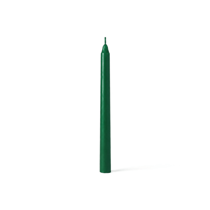 Single green taper candle on white background