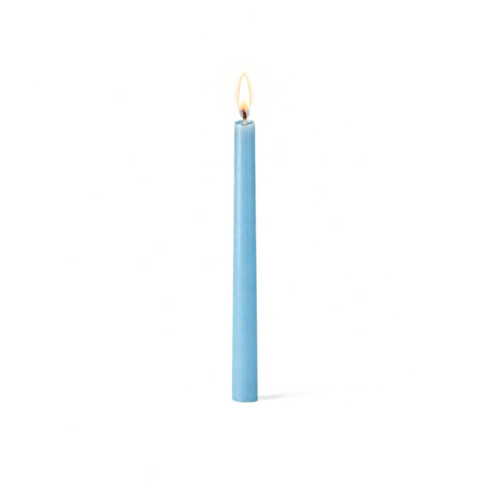 Lit light blue taper candle on white background