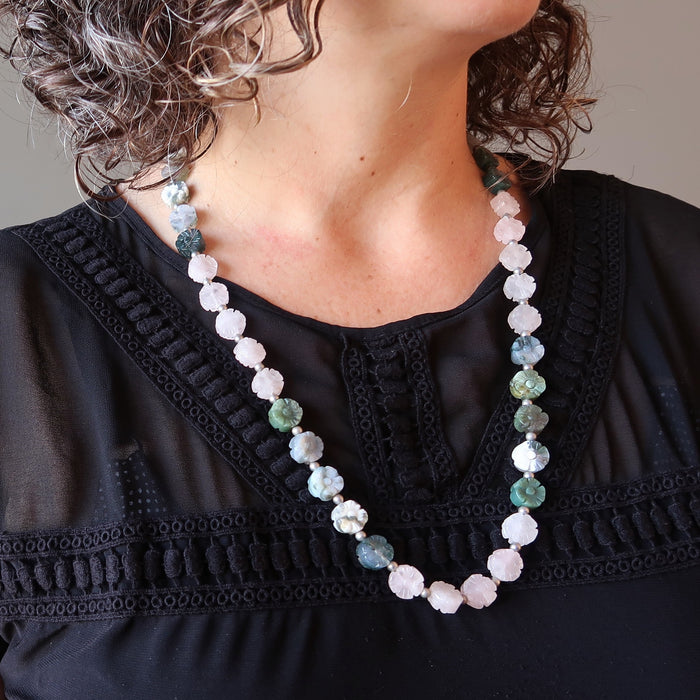woman modeling a rose quartz moss agate flower necklace