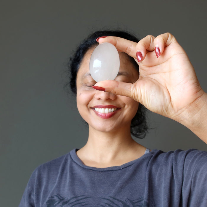 rutilated quartz egg at third eye chakra