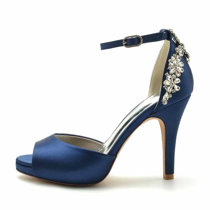 S&DCo. satin peep toe wedding shoes in blue with elegant embellishments and ankle strap