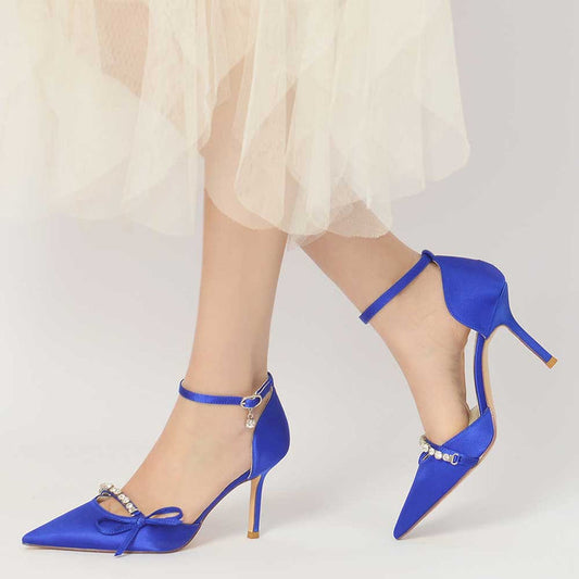 Satin prom heels with bow in royal blue featuring ankle strap and decorative embellishments