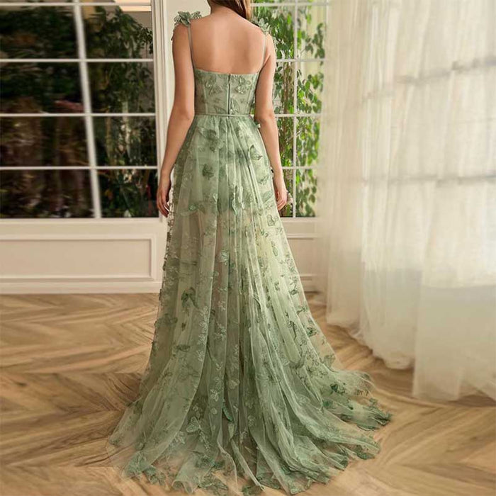 Elegant butterfly tulle prom dress with a flowy design and floral detailing, perfect for special occasions