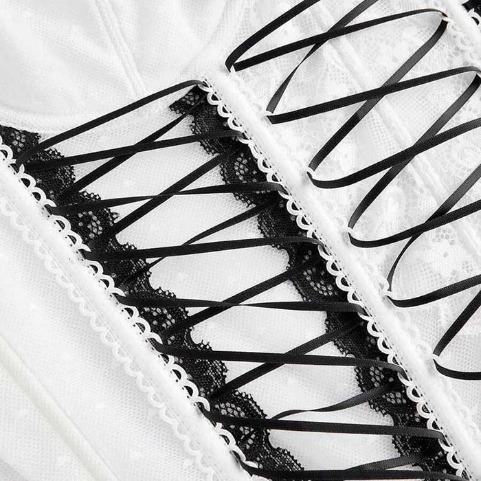 Elegant cross lace tank top for women featuring intricate black lace detailing and stylish ribbon accents