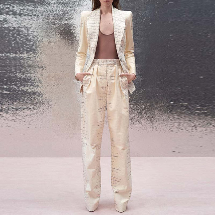 Ivory animal print suit for women from SD Dresscode & Fashiontrends with elegant design and tailored fit