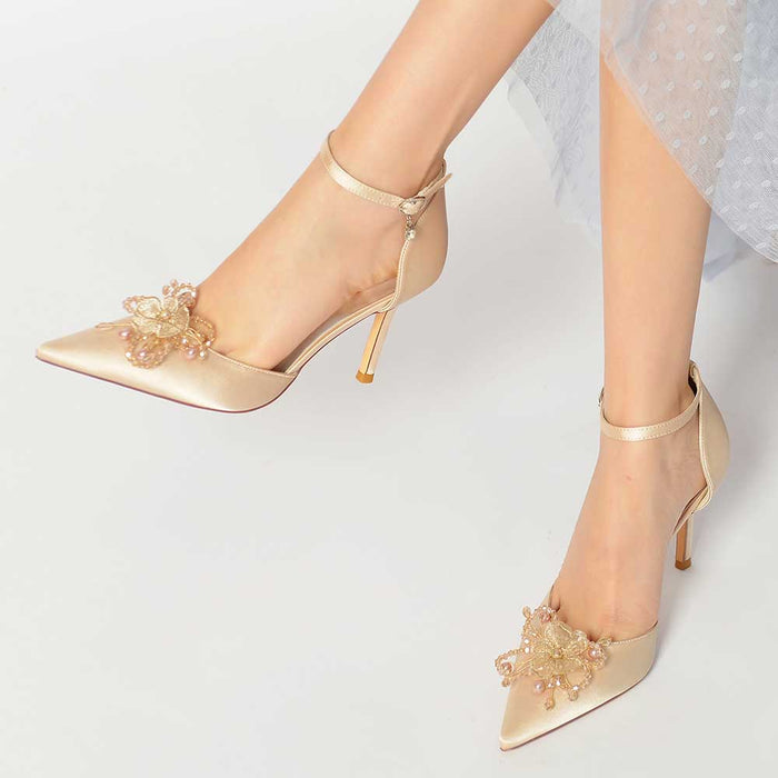 Elegant satin bridal heels with crystals featuring decorative floral embellishments for a stylish look