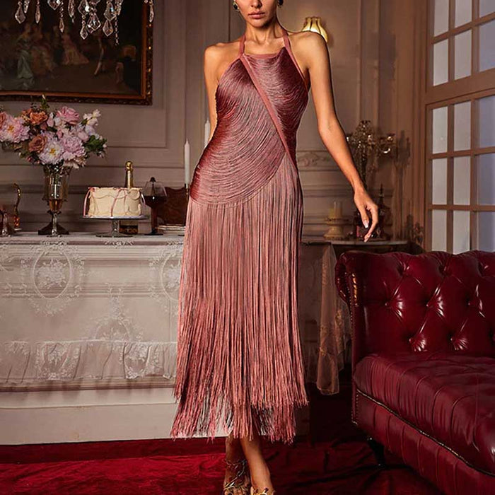 Elegant strappy bodycon dress with tassel details in rose gold, perfect for special occasions