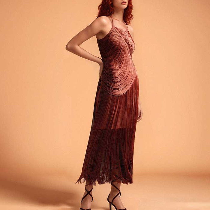 SD Dresscode strappy bodycon dress with tassel details in rust color, perfect for evening outings.