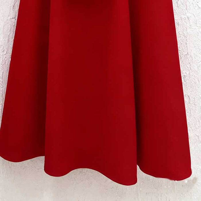 Elegant red women's two piece skirt suit with a flattering cut for stylish office wear