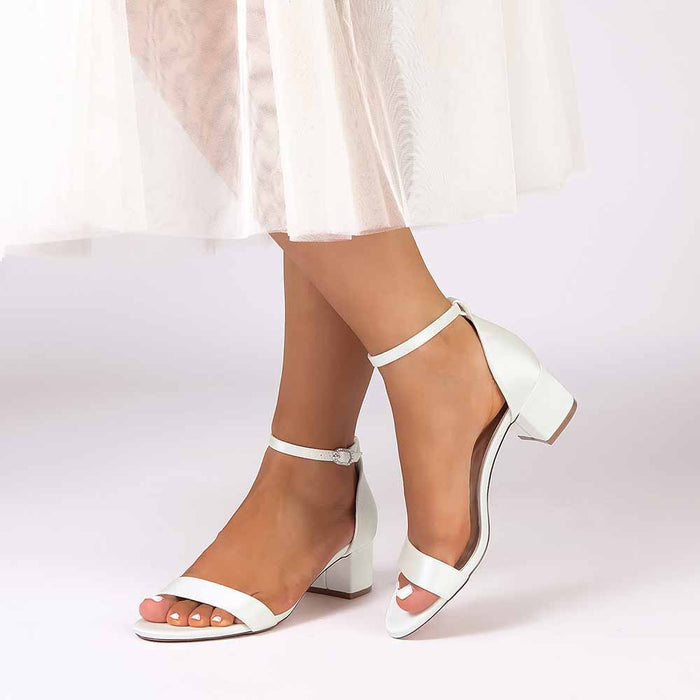 Elegant white chunky heel wedding sandals with ankle strap for comfort and style