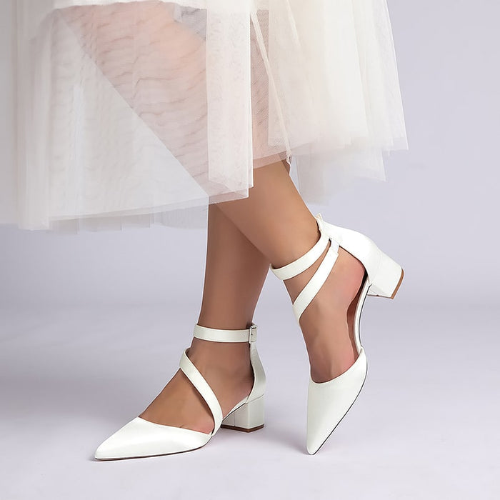 Elegant cross strap wedding shoes in white with block heels, perfect for bridal wear