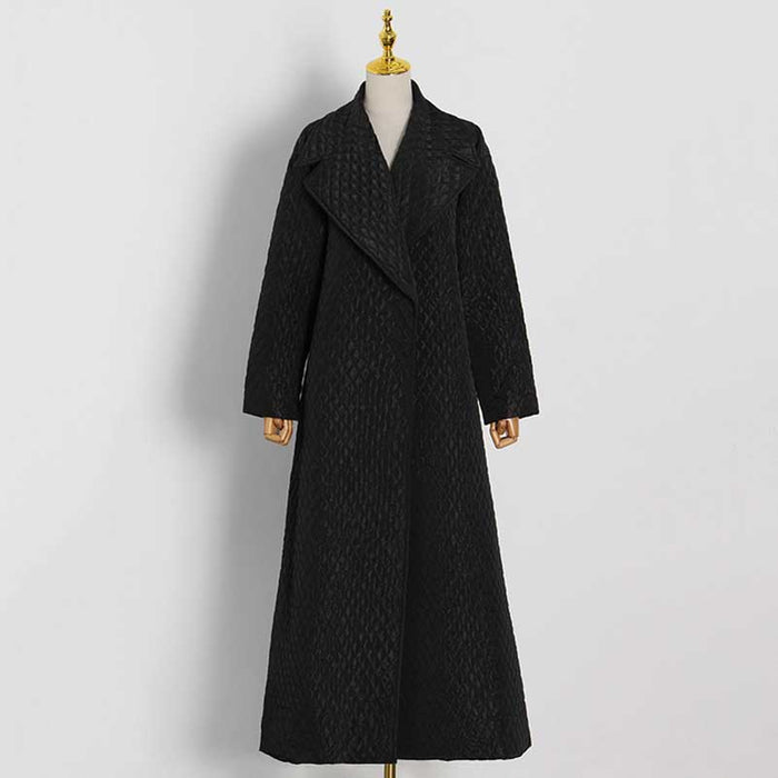 Elegant oversized black winter jacket for women with a long, flowy design and stylish collar