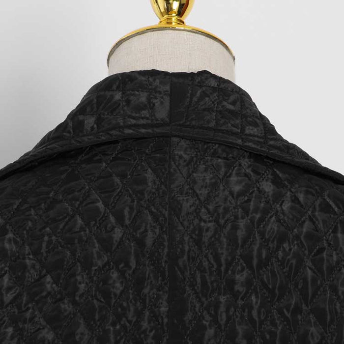 Oversized black winter jacket for women with a quilted texture and collar detail