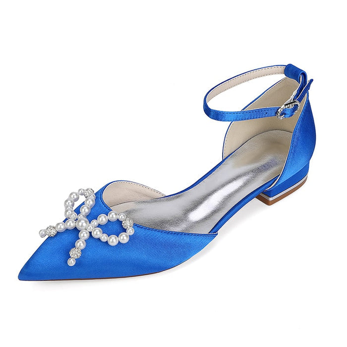 Blue satin bridal flats with pearl embellishments and ankle strap for elegant wedding style