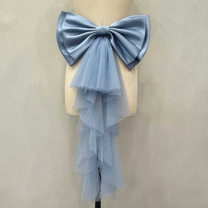 Satin wedding bow for bridal dress in light blue with layered tulle tails for a stunning bridal look