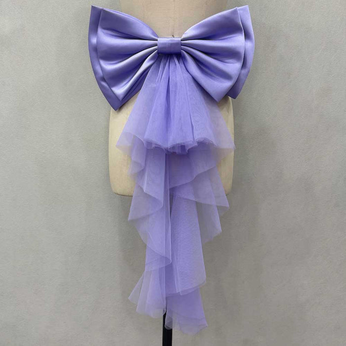 Satin wedding bow for bridal dress in lavender with layered tulle detailing for elegant wedding attire