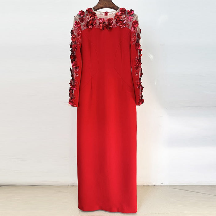 Elegant red floral embellished formal gown with intricate floral details on sleeves