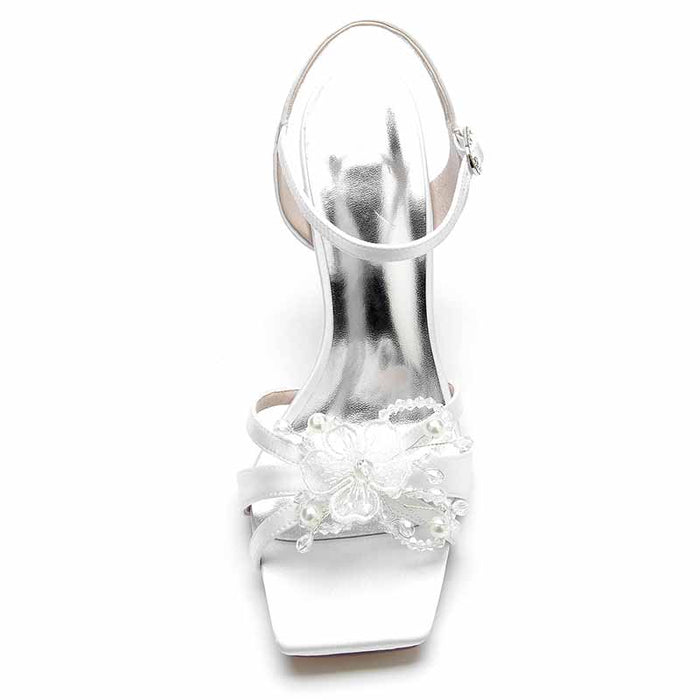 Elegant white satin pump heel sandal for bridesmaids featuring flower embellishments and a stylish ankle strap