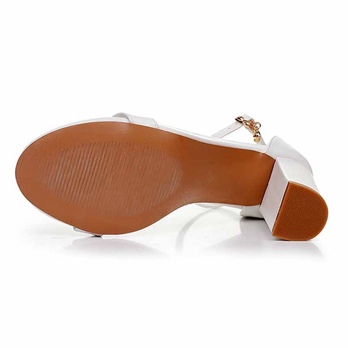 White ankle strap chunky heels with a stylish design and sturdy base for comfort and support