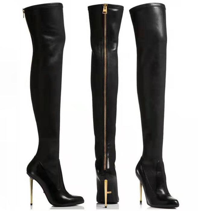Sleek black womens thigh high boots with high heels and a stylish gold zipper detail