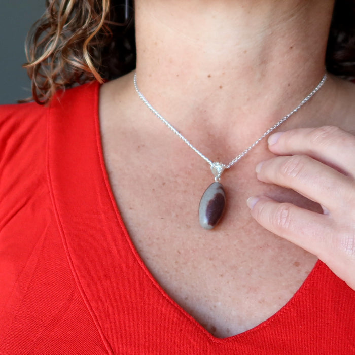 shiva lingam necklace on female model