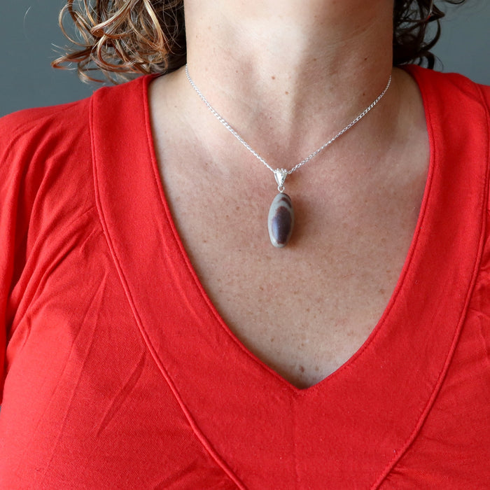 shiva lingam necklace on female model