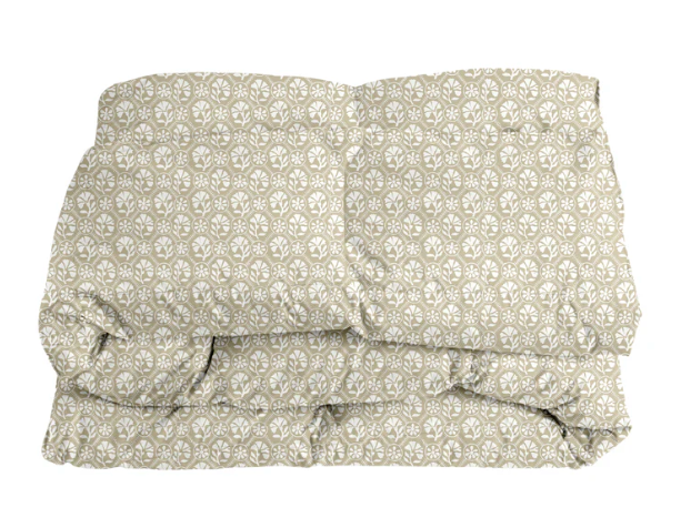 Sophie Comforter — Fawn colorway shown as a folded comforter mockup with a warm neutral repeating motif; Wheaton Whaley Home
