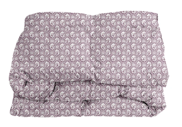 Sophie Comforter — Orchid colorway shown as a folded comforter mockup with a purple-ground repeating motif; Wheaton Whaley Home