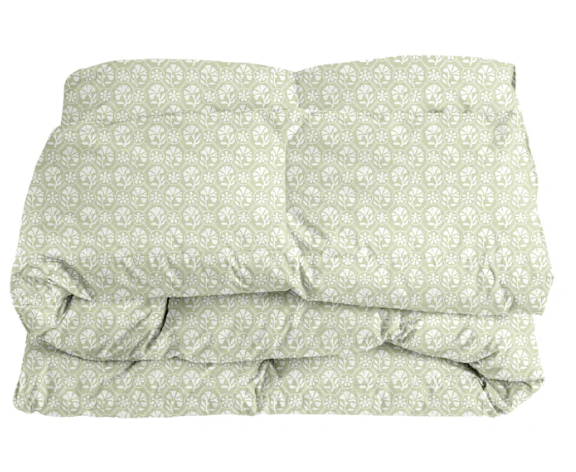 Sophie Comforter — Celadon colorway shown as a folded comforter mockup with a pale green repeating motif; Wheaton Whaley Home