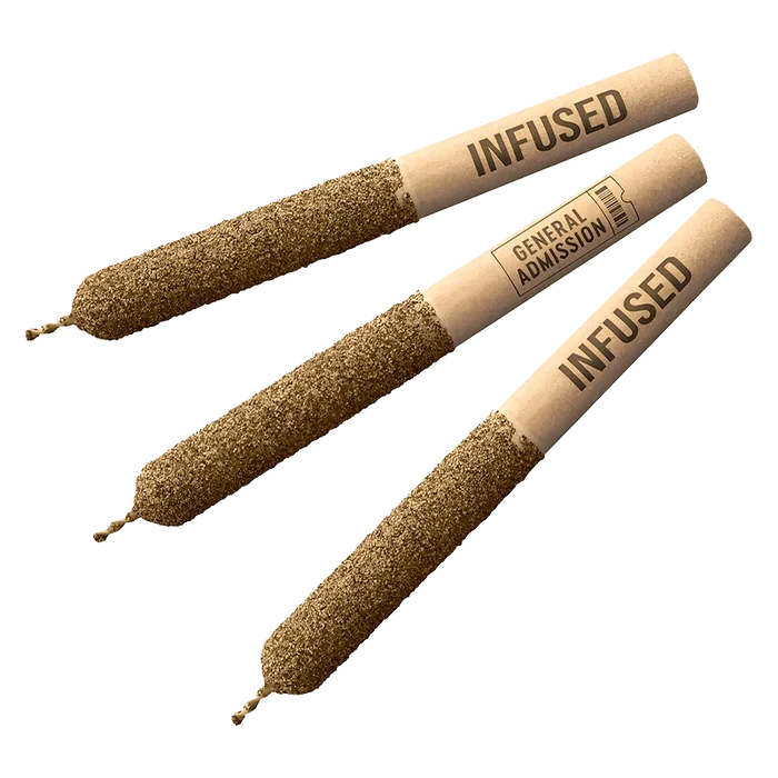 A close-up shows three StrawKiwi Distillate Infused Pre Rolled 0.5 g cartridges against a plain white backdrop.