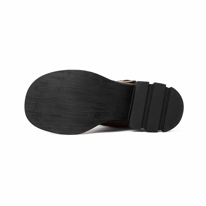 Sole of stylish women's boots for prom featuring durable black rubber design for comfort and grip