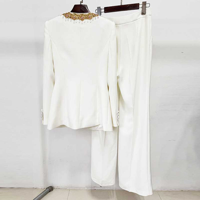 Elegant white tailored women's trouser suit for special occasions with decorative collar detail