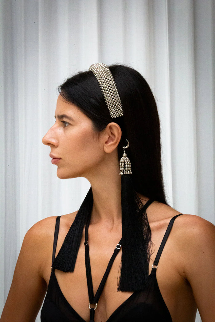 Object & Dawn Teuta Headband silver side view worn by woman in neutral background