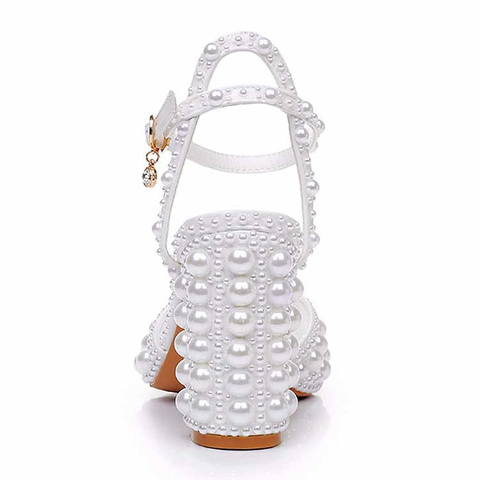 White chunky wedding sandals designed with pearl embellishments for stylish brides
