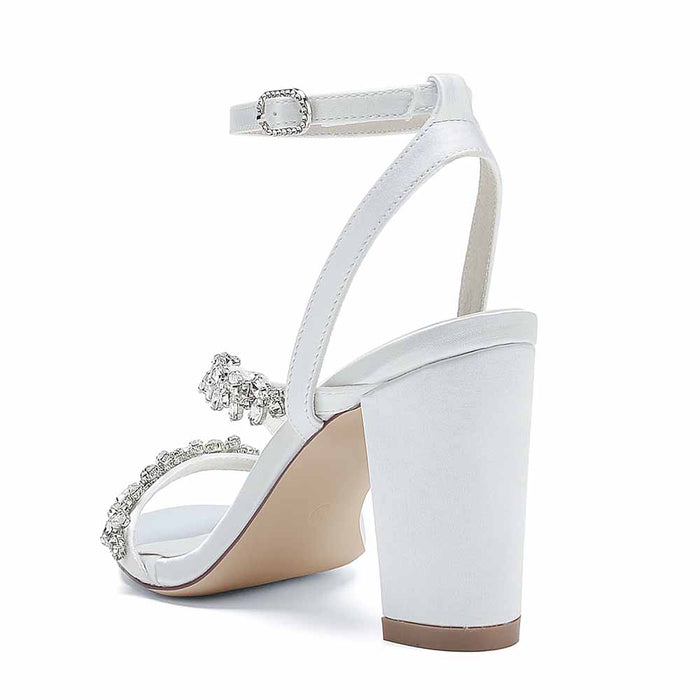 Elegant S&DCo. white block heels sandals with rhinestone embellishments and ankle strap