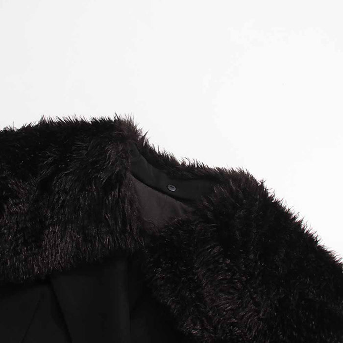 Women's black belted winter coat with fur collar detail for added warmth and style