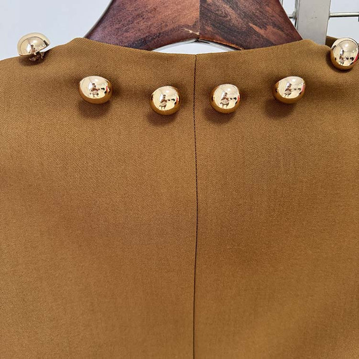 Close-up of women's brown tailored pantsuit showcasing unique gold button details on the back