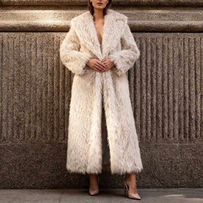 Stylish women's faux fur winter coat long in cream color with a luxurious fluffy texture