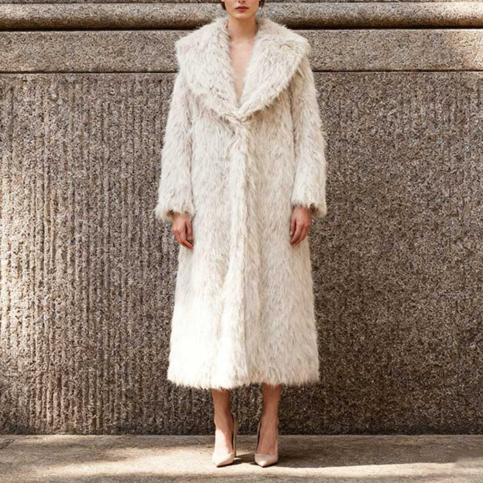 Elegant women's faux fur winter coat long in cream color, perfect for chic winter styling