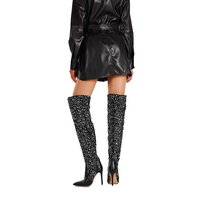 Stylish women's over the knee glitter boots with high heels, perfect for trendy outfits