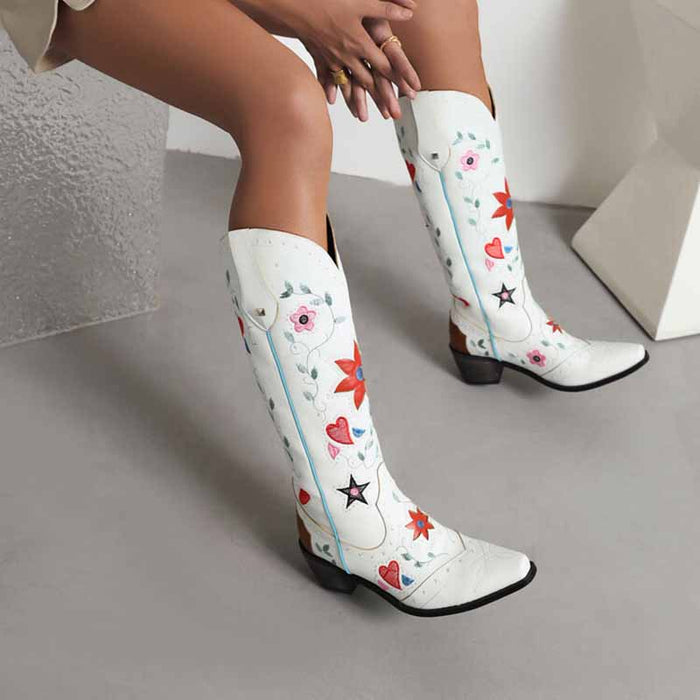 Women's retro floral cowboy boots with colorful embroidered flowers and stars on white leather