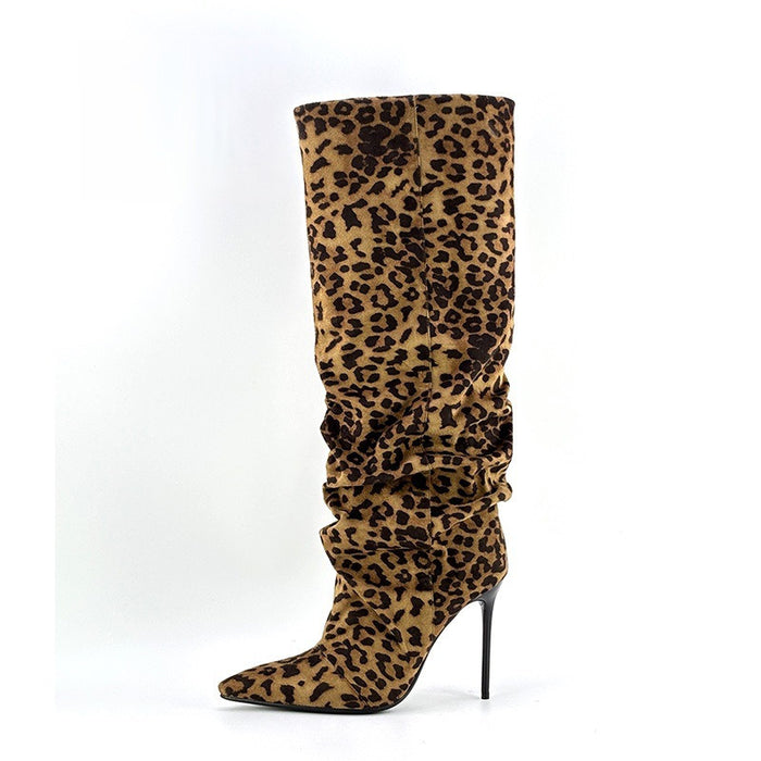 Leopard print knee-high boot on a white background