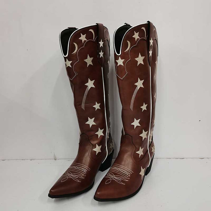 Brown star pattern knee high cowgirl boots with intricate white star designs and pointed toe