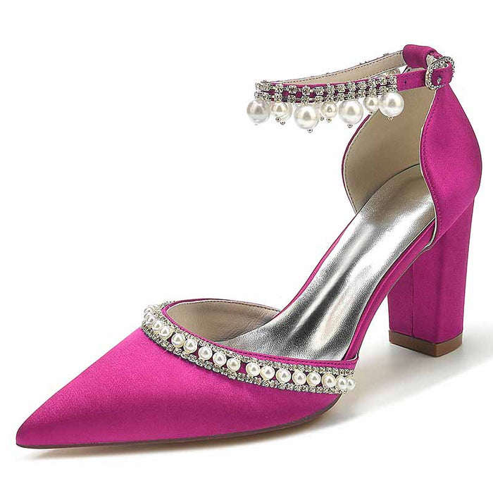 Elegant women's white block heel wedding shoes adorned with pearls and rhinestones for a stylish bridal look